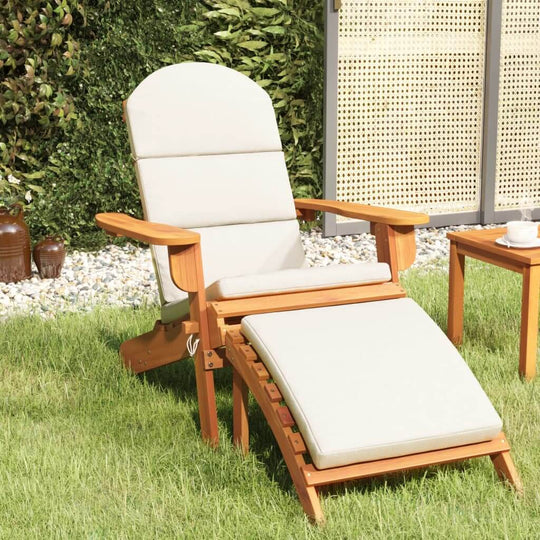 Adirondack garden chair with footrest in solid acacia wood, perfect for outdoor lounging and relaxation.