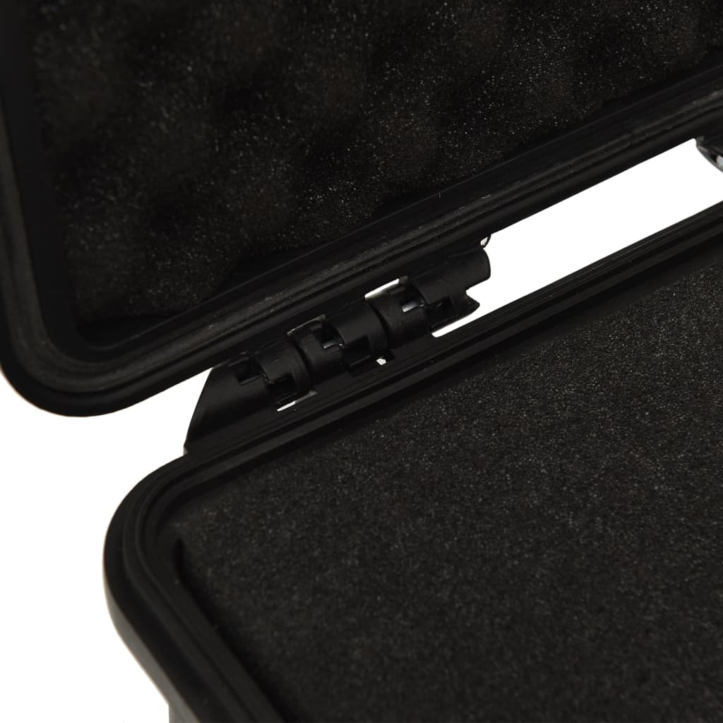 Close-up view of the interior of a black portable flight case showcasing its durable hinge and protective foam lining.