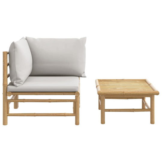 2 Piece garden lounge set with light grey cushions and bamboo frame for stylish outdoor relaxation.