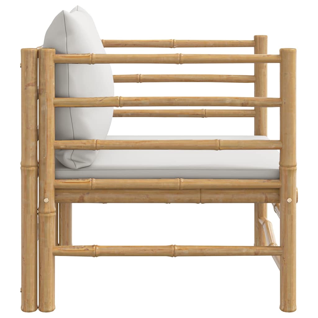 Side view of Garden Sofa with Light Cushions Bamboo featuring elegant design and durable bamboo frame for outdoor comfort.
