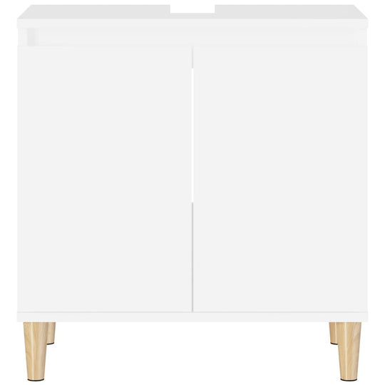 White sink cabinet with wooden legs, engineered wood design, perfect for bathroom storage and a modern touch.