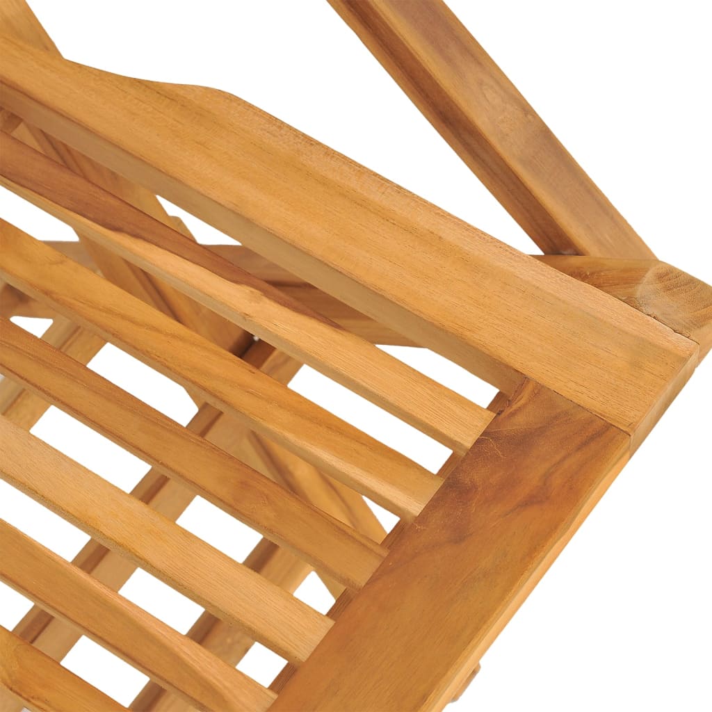 Close-up view of the solid teak wood structure of a folding garden chair, showcasing its smooth finish and sturdy design.