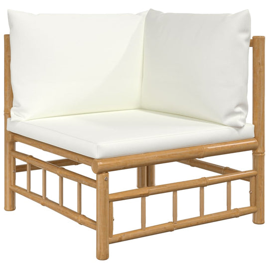 Corner lounge chair with cream white cushions and bamboo frame for outdoor seating. Ideal for garden furniture.