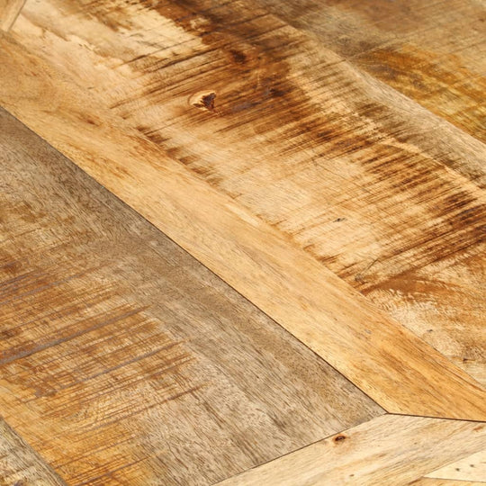 Close-up of solid mango wood surface showcasing unique wood grains and rustic texture for furniture design.