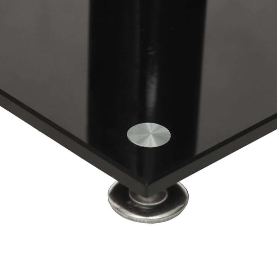 Close-up view of speaker stand base featuring durable black tempered glass and a sturdy metal foot, ideal for home furniture.