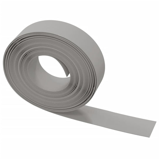 Flexible grey polyethylene garden edging roll, 10 m long and 15 cm wide, ideal for outdoor flower bed borders and paths.