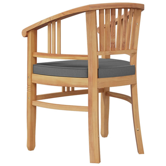 Solid teak garden dining chair with ergonomic design and gray cushion for comfort and style.