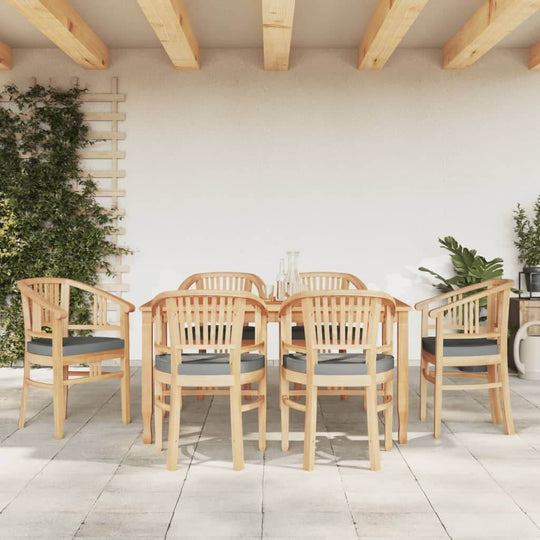 7 piece teak garden dining set featuring ergonomic chairs and a smooth finish, perfect for outdoor dining and relaxation.