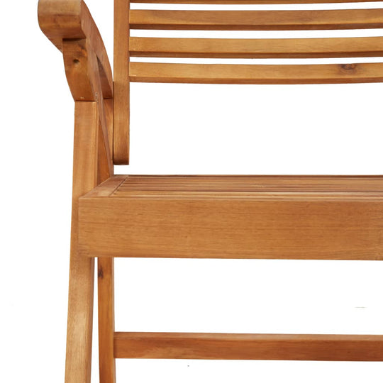 Close-up of a solid acacia wood dining chair featuring slatted backrest and armrests, perfect for outdoor furniture relaxation.