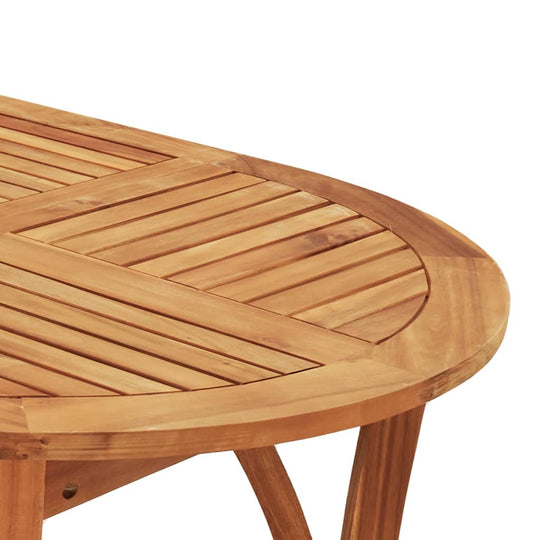 Close-up of a round acacia wood garden dining table showcasing its beautiful slatted surface and sturdy construction.