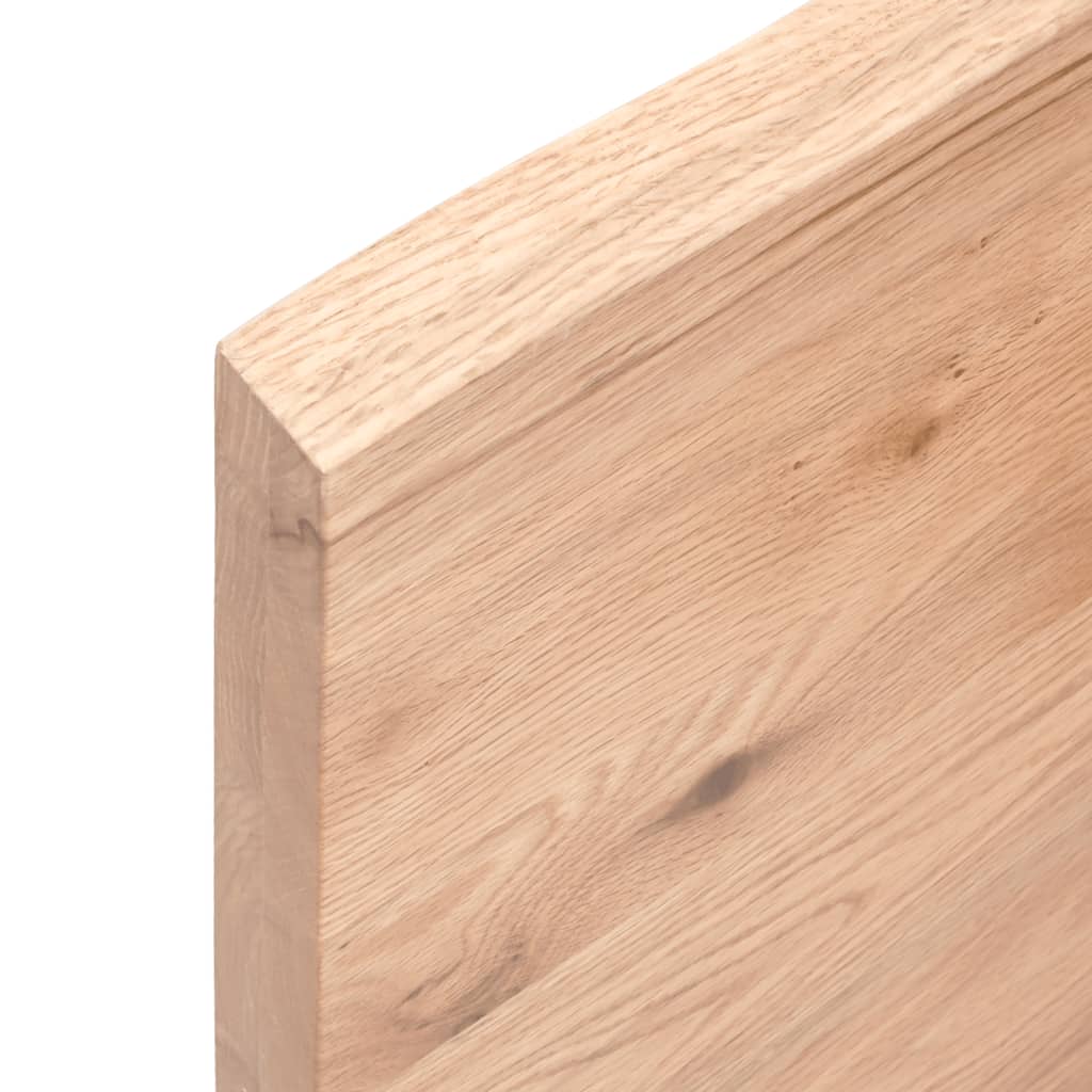 Close-up of light brown solid oak wood edge showcasing natural grain and texture for wall shelf.