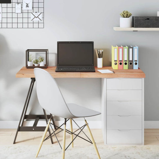 Modern desk setup with wooden tabletop, laptop, stationery, and storage drawers in a stylish workspace. FURNITURE and مفروشات.