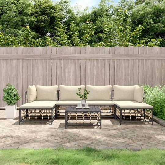 7 Piece outdoor lounge set with cushions in anthracite poly rattan, perfect for garden and terrace relaxation.