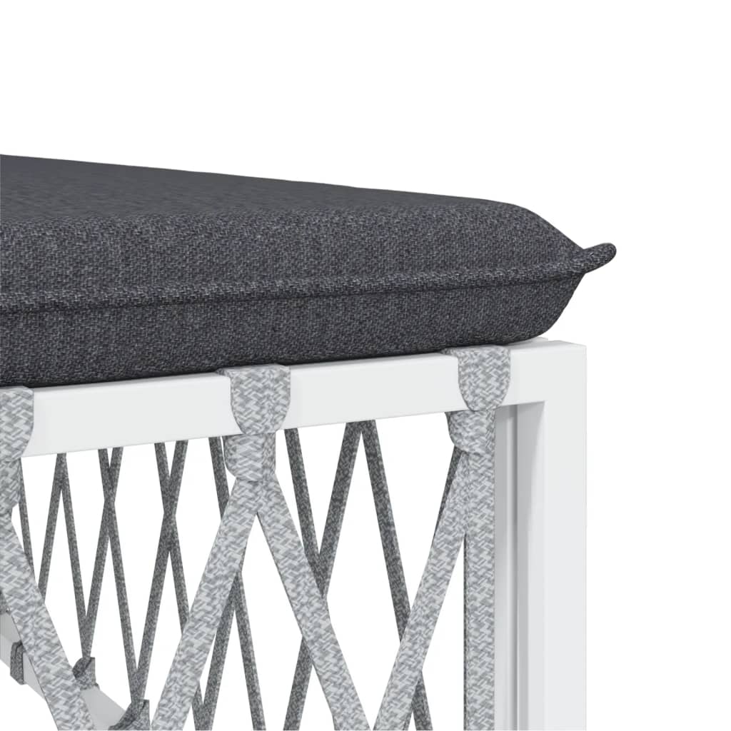 Close-up of cushion on a white steel lounge set, featuring durable woven fabric and sturdy frame for outdoor furniture.