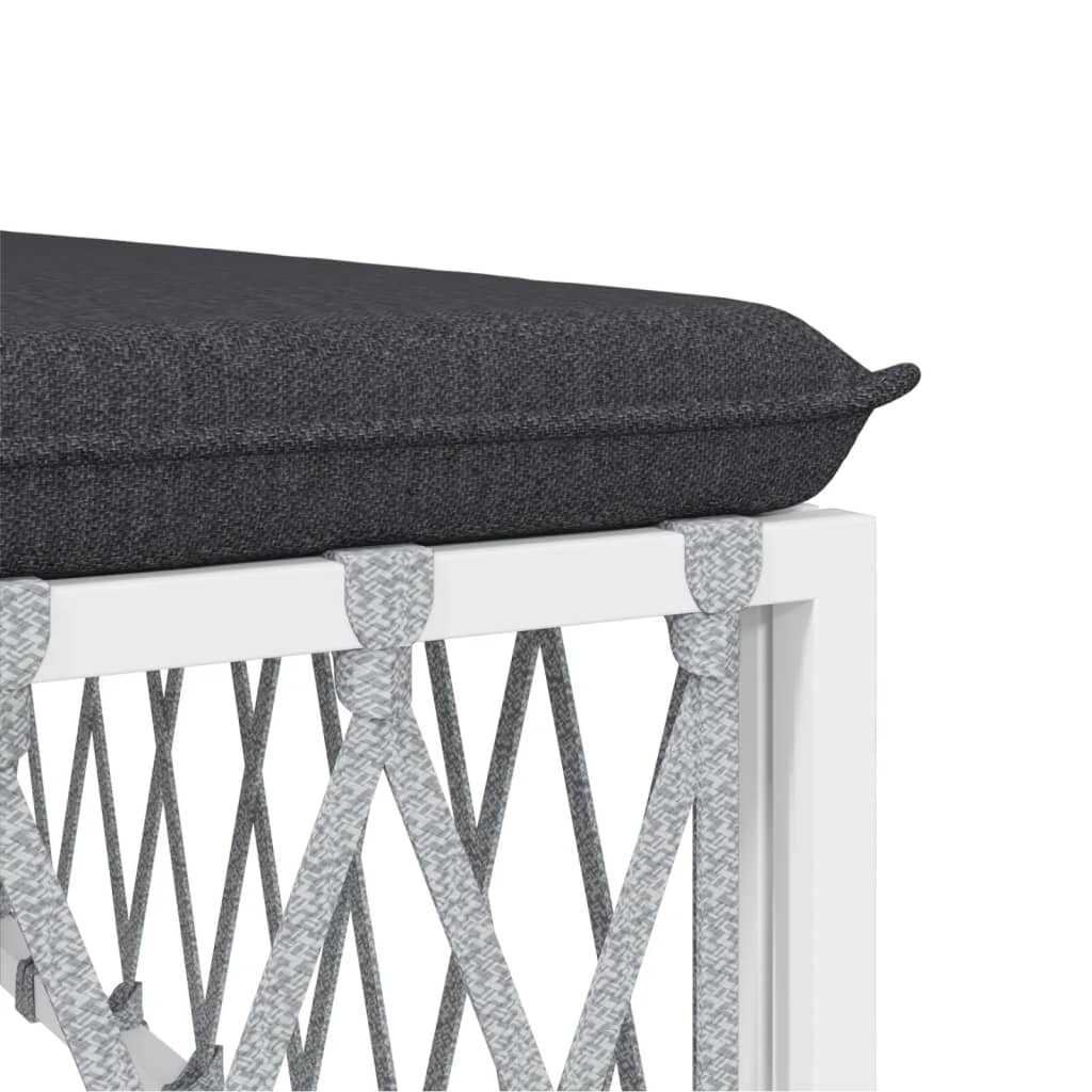 Close-up of a dark cushion on a white steel frame, part of a durable outdoor lounge set designed for comfort and style.