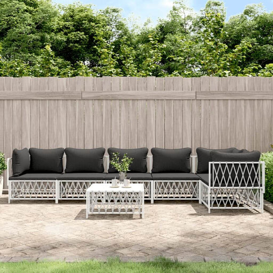 7 Piece outdoor lounge set with black cushions and white steel frame, perfect for garden and patio relaxation.