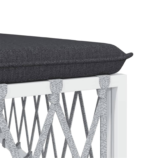 Close-up of cushion on 8 piece garden lounge set, showcasing durable woven fabric and sturdy white steel frame.