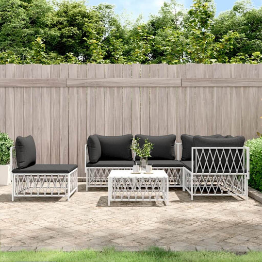 6 piece garden lounge set with black cushions, white steel frame in outdoor space, perfect for relaxing and entertaining.