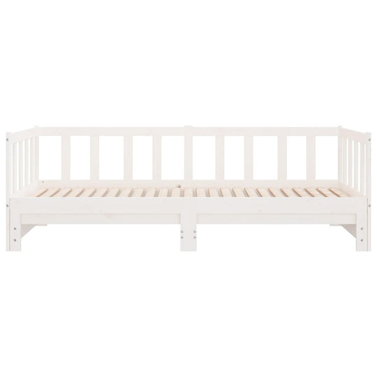 White pull-out day bed made of solid pine wood, featuring a slatted design for durability and style, perfect for lounge or bedroom use.