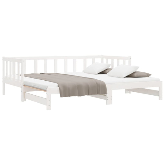 Pull-out day bed in white with slatted design, ideal for bedroom or living room, featuring solid pine wood and modern aesthetic.