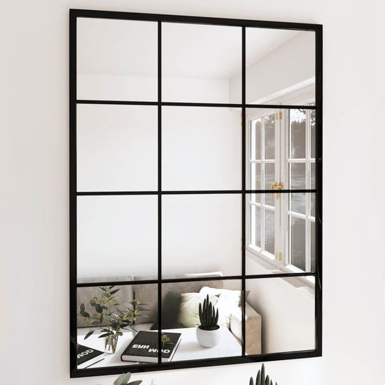 Modern black wall mirror with grid design, enhancing indoor decor and maximizing space in any room.