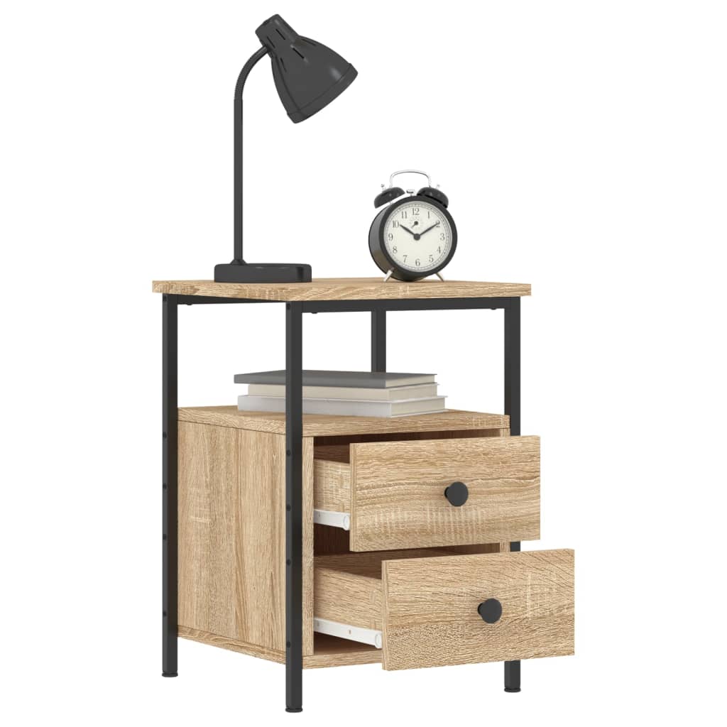 Bedside cabinet in Sonoma oak with iron frame, table lamp, clock, and books, ideal for modern bedroom decor.