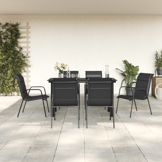 7 piece black steel garden dining set with textilene chairs on a patio, perfect for outdoor meals and gatherings.