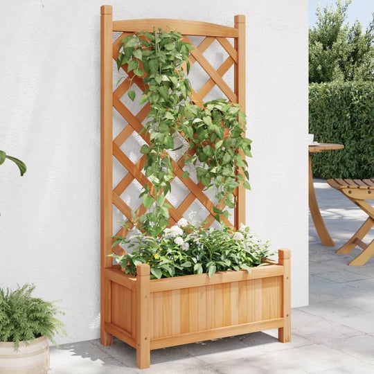 Wooden planter with trellis supporting climbing plants in a patio setting, showcasing outdoor furniture design.