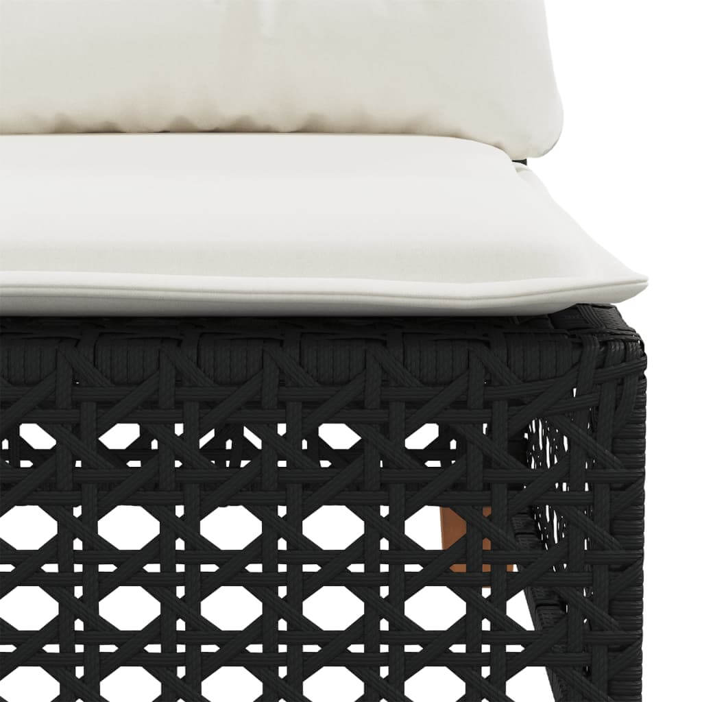 Close-up of black poly rattan garden sofa seat with white cushion, showcasing durable outdoor furniture design.