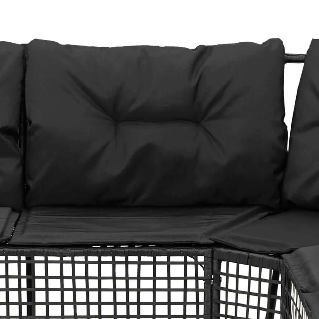 Close-up of L-shaped garden sofa cushions in black, showcasing comfort and durability for outdoor lounging furniture.