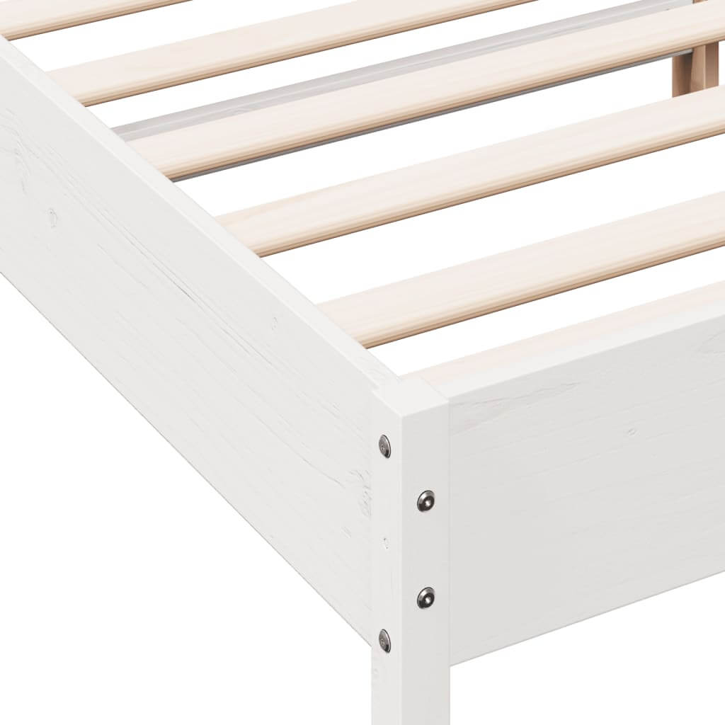 Close-up of white solid pine bed frame showcasing plywood slats for optimal weight distribution and sturdy construction.