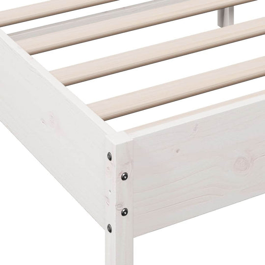 Close-up of white solid wood bed frame with plywood slats, showcasing durability and rustic design for furniture.