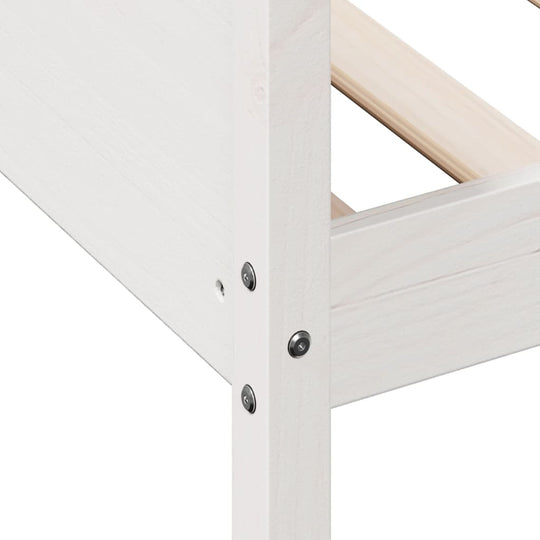 Close-up of the white solid pinewood frame of a day bed, showcasing the sturdy construction and natural finish.