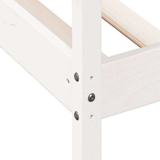 Close-up of the solid pine wood frame of a white day bed, showcasing the natural grain and secure metal fastenings.