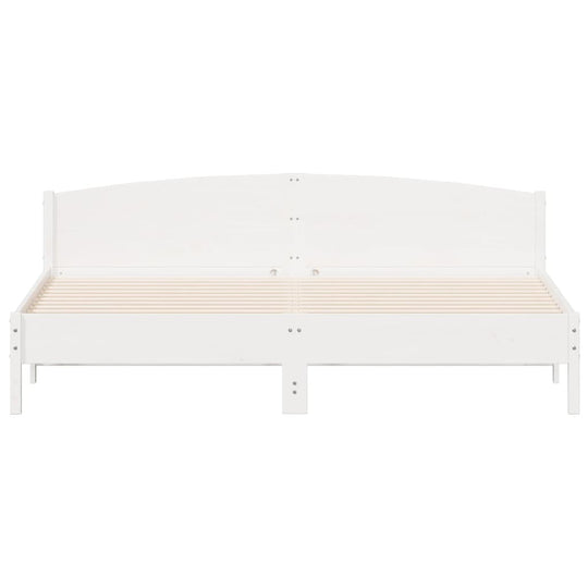 White solid wood bed frame 180x200 cm super king with plywood slats, ideal for a stylish bedroom interior.