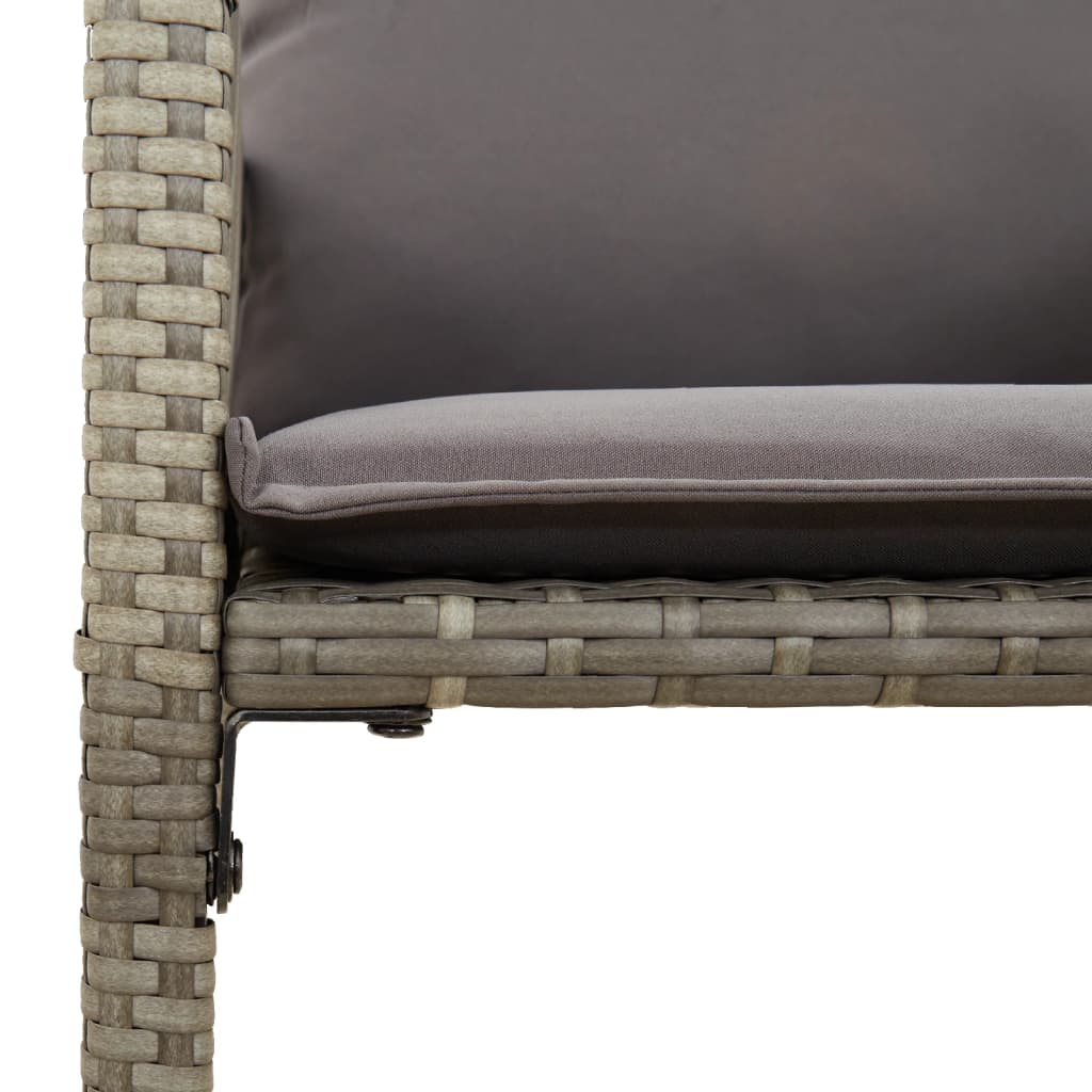 Close-up of grey poly rattan garden bar stool with cushion, showcasing comfortable seating and durable material.