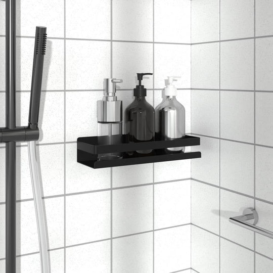 Shower shelf in matte black showcasing sleek design, holding various toiletries against tiled wall, ideal for maximizing space.