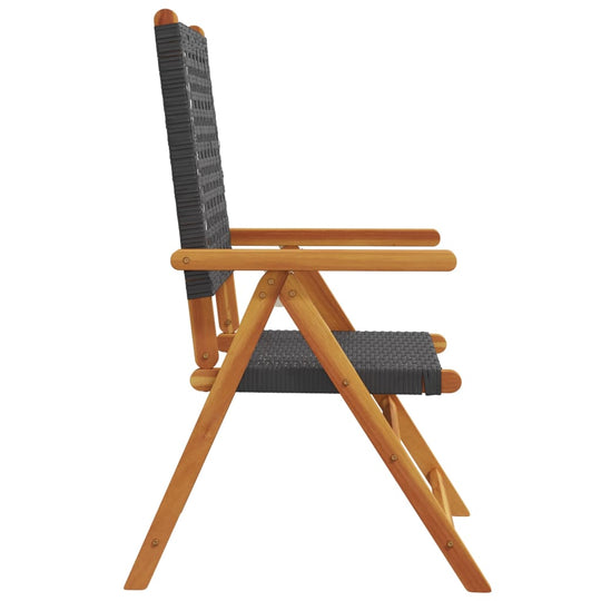 Side view of a reclining garden chair made of black poly rattan and solid acacia wood, perfect for outdoor lounging.