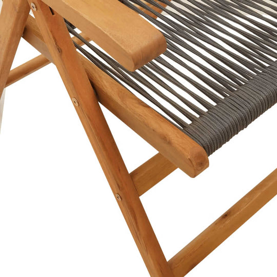 Close-up of a grey woven reclining garden chair with solid acacia wood frame, showcasing its sturdy construction and design.