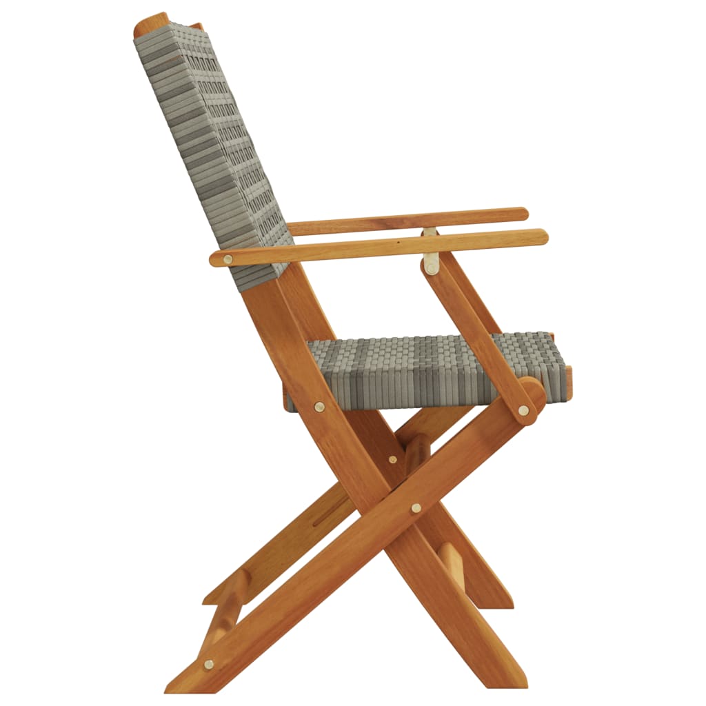 Side view of a comfortable folding garden chair made of grey poly rattan and solid acacia wood. Perfect for outdoor furniture.