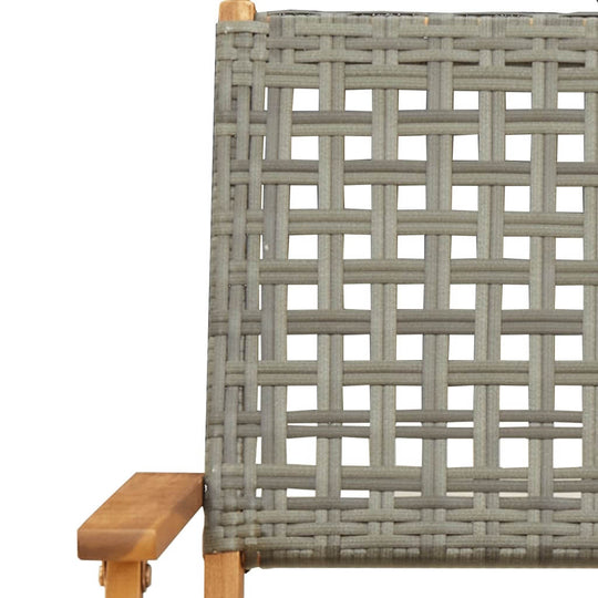 Grey poly rattan weave detail on a folding garden chair, highlighting durability and outdoor furniture design.