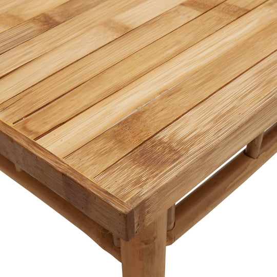 Close-up of a bamboo coffee table surface showcasing its slat design and natural wood finish, ideal for outdoor furniture.