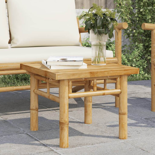 Bamboo coffee table 45x45x35 cm, perfect for outdoor lounge furniture, featuring slat design for ventilation.