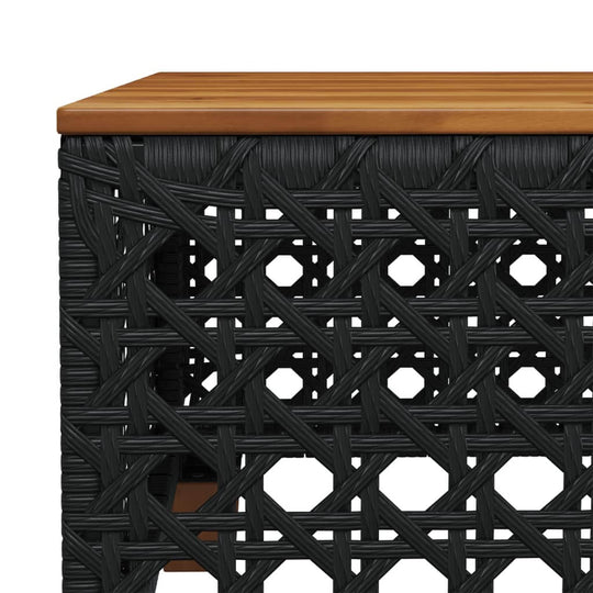 Close-up of black poly rattan woven side table with wooden top, ideal for outdoor furniture and lounge settings.