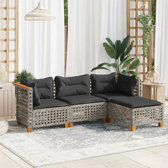 4 piece grey poly rattan garden sofa set with black cushions, perfect for outdoor lounge furniture.