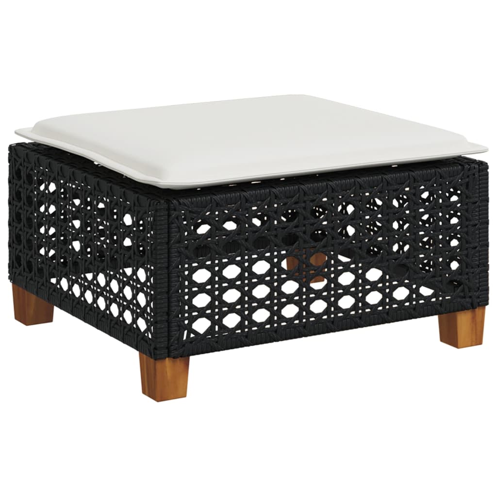 Black poly rattan outdoor coffee table with white cushion, perfect for garden or patio furniture.