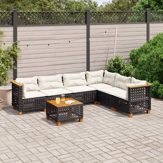 7 piece outdoor lounge sofa set in black poly rattan with cream cushions, perfect for backyard and patio relaxation.