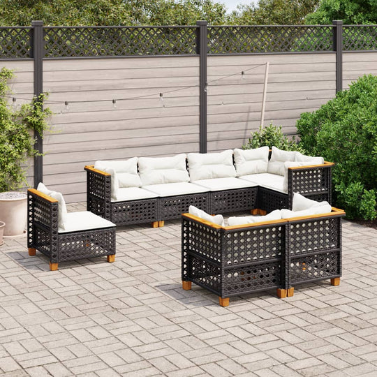 8 piece outdoor garden sofa set with cushions in black poly rattan on a patio with greenery, perfect for lounging and relaxation.