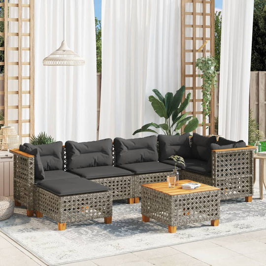 7 Piece grey poly rattan garden sofa set with cushions, perfect for outdoor lounging and patio relaxation.