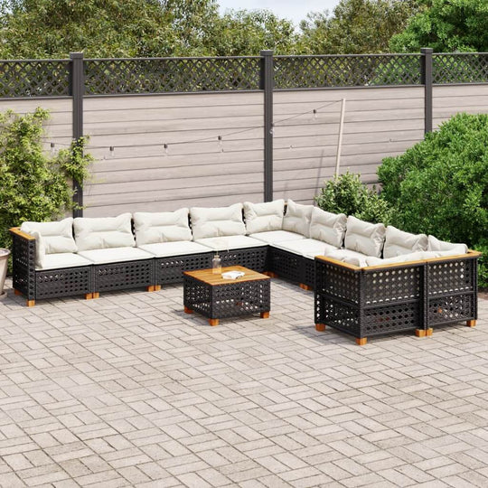 11 piece outdoor garden sofa set with cushions in black poly rattan, perfect for patio and terrace lounging.